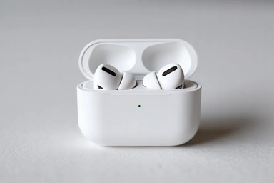 Wireless earbuds in a charging case